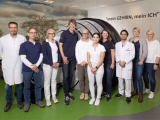Staff at Bonifatius Hospital Lingen stand in a group near the ZAP-X